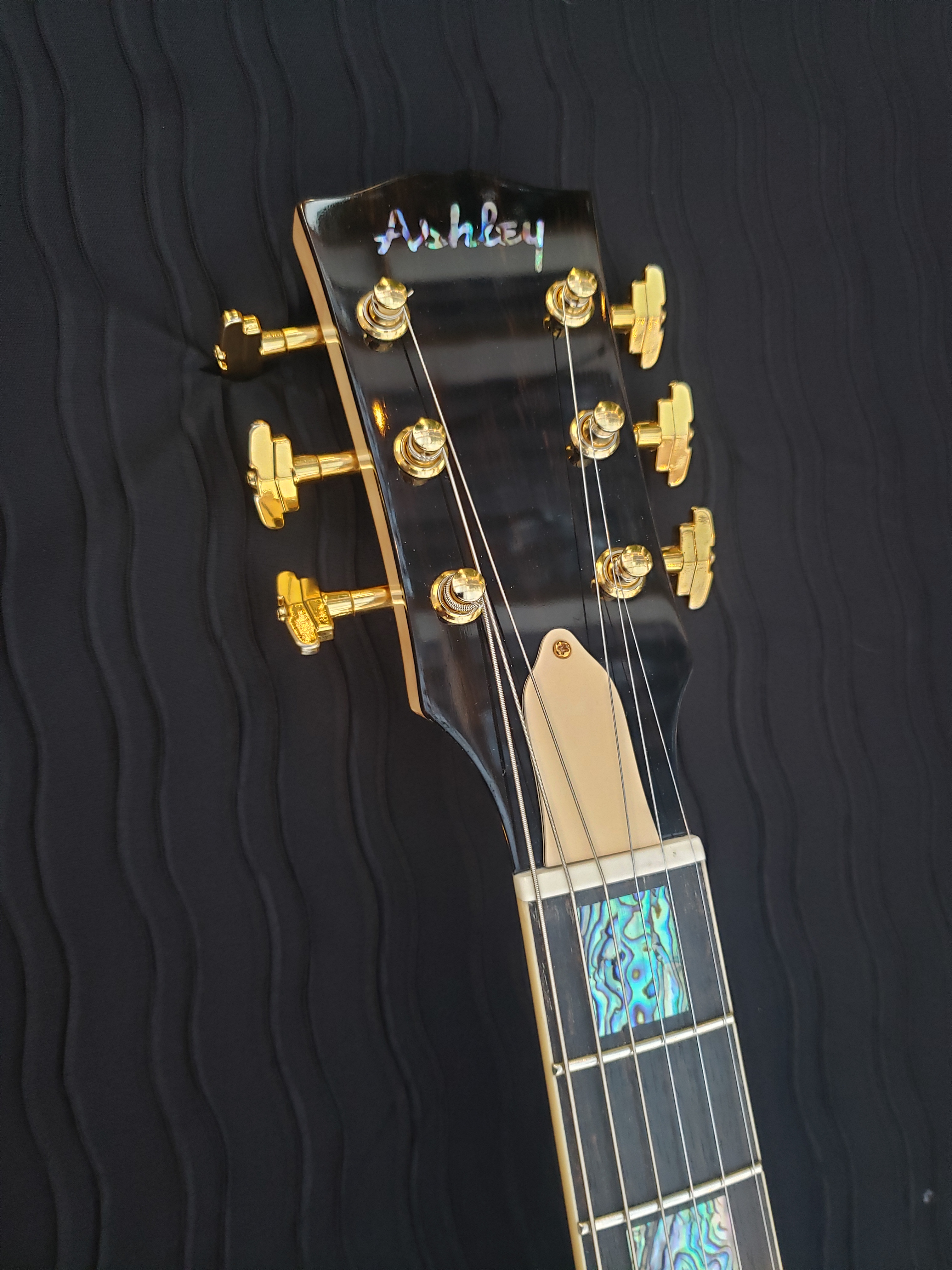 Ashley V headstock, custom headstock inlay, ebony peghead overlay