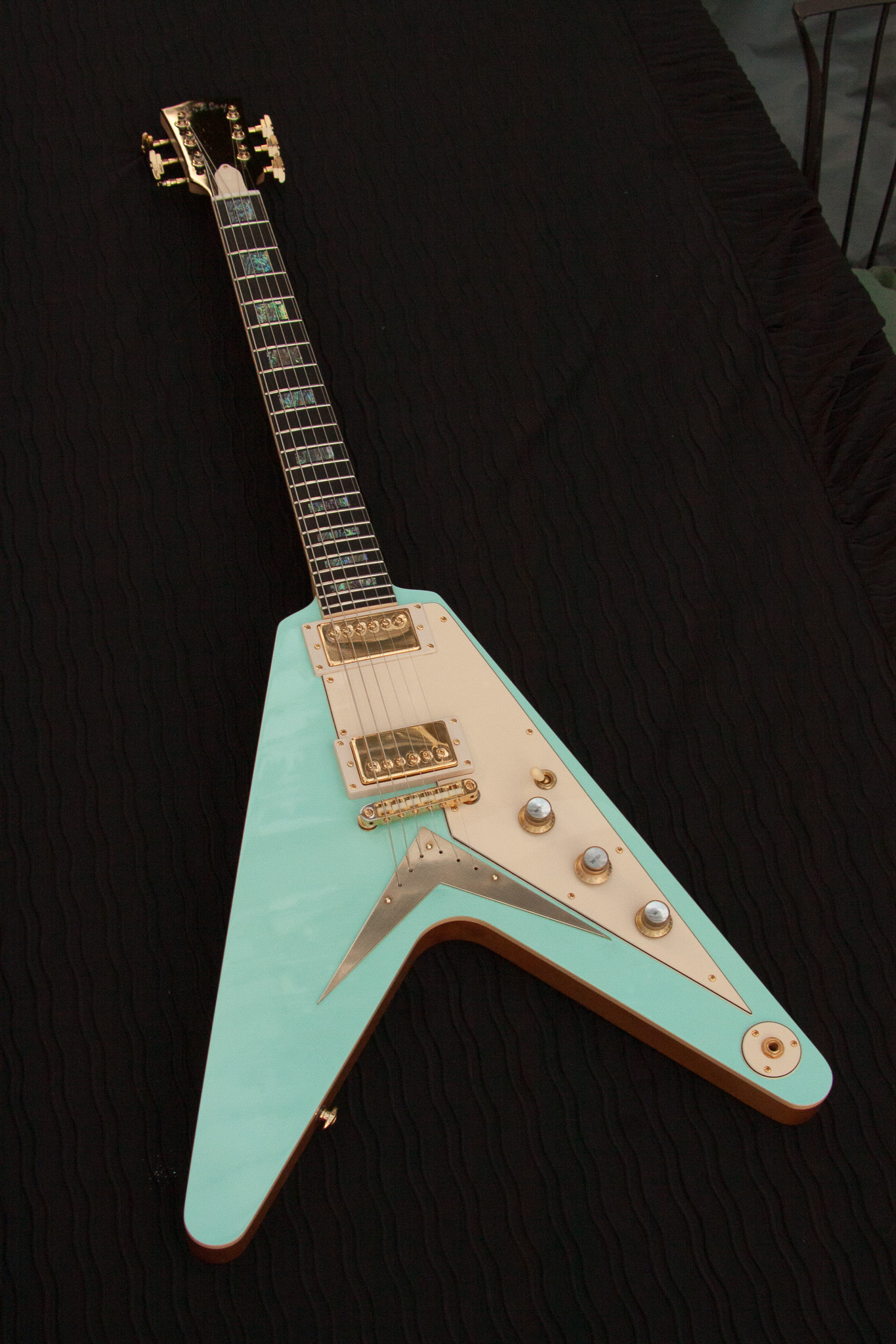 The Ashley V, custom flying V, alder body, maple neck, ebony fretboard, abalone inlay