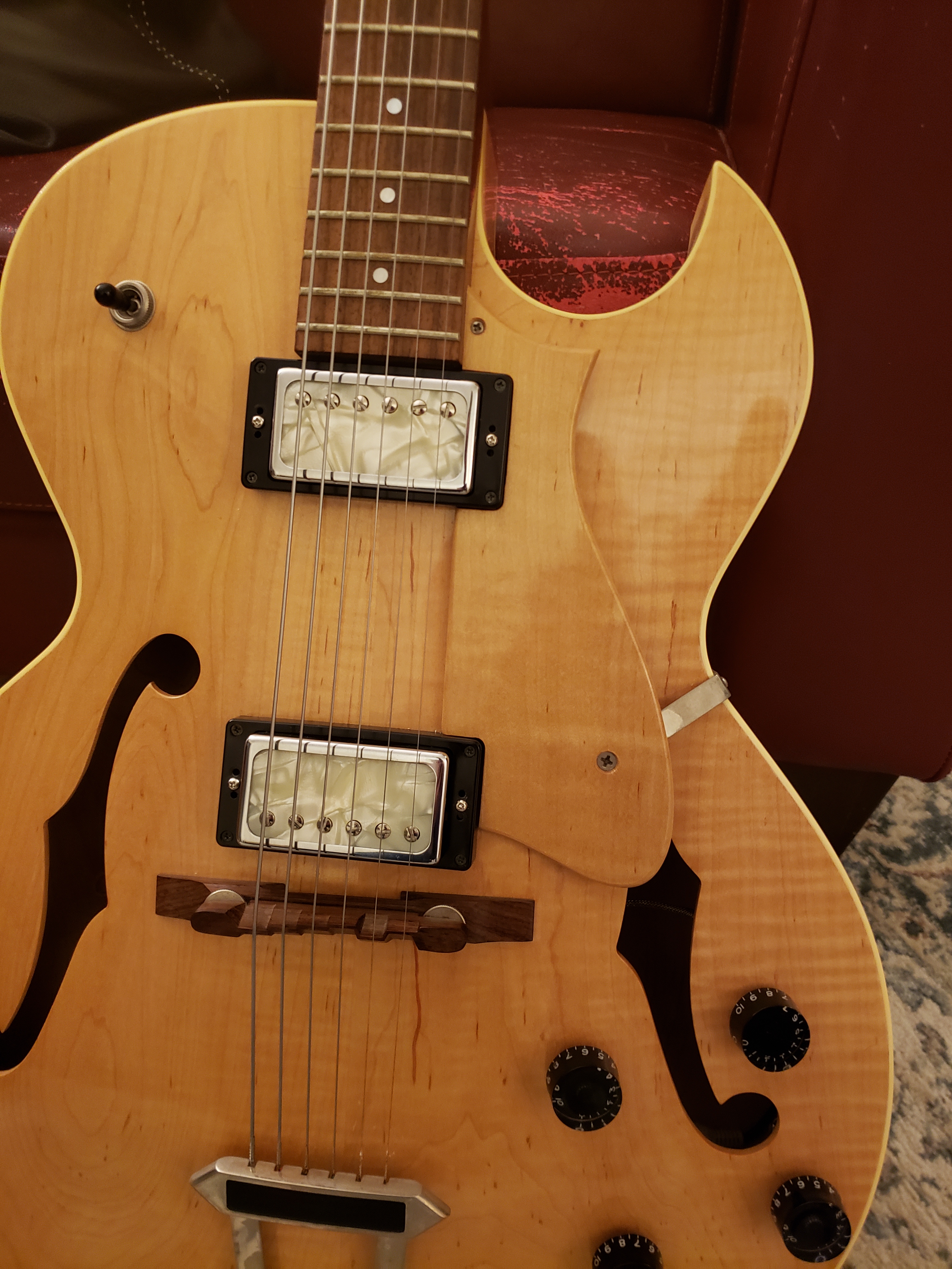 Custom wound pickups with pearl insets