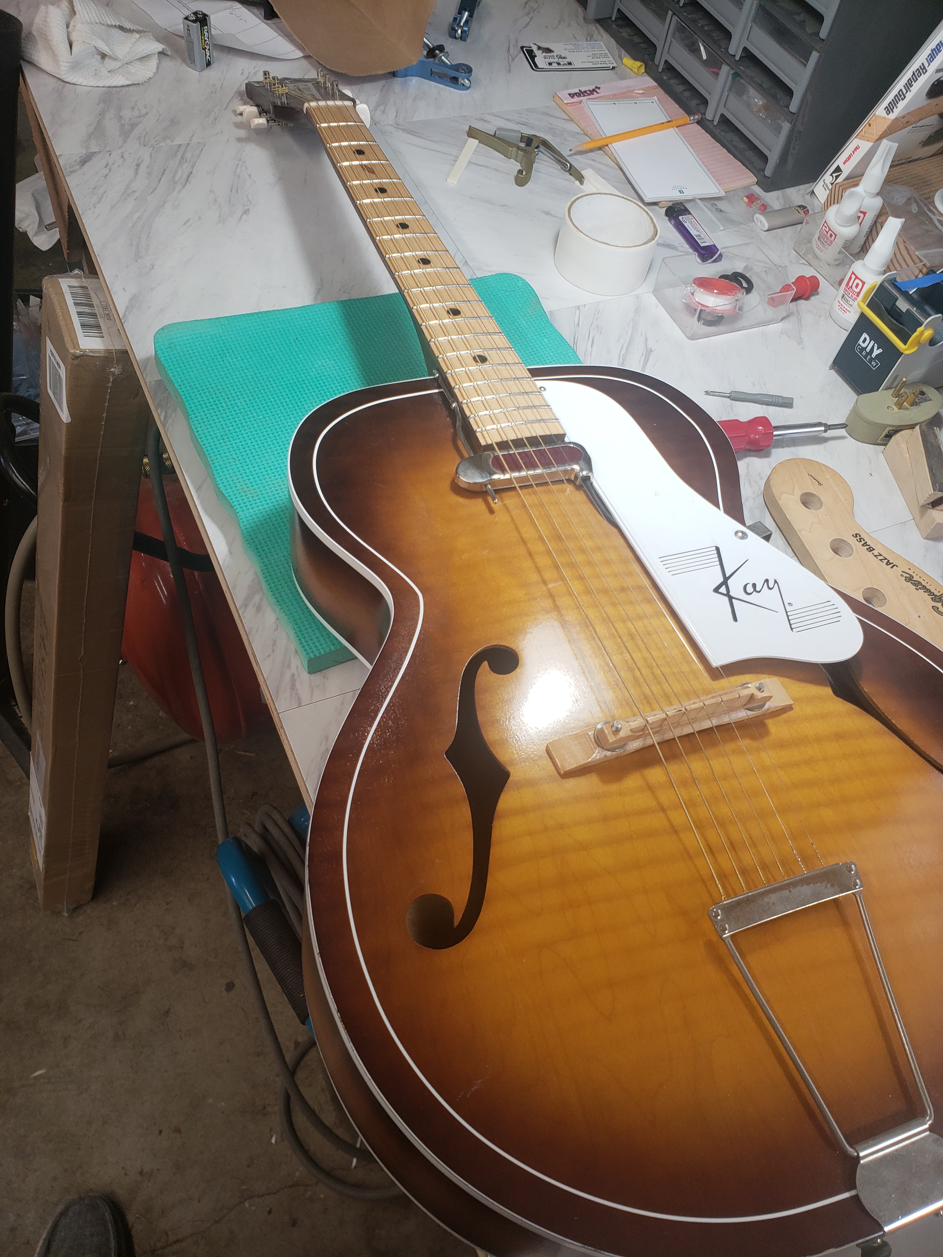 Leveled and refinished fretboard, replaced fret dots, refretted, added DeArmond pickup