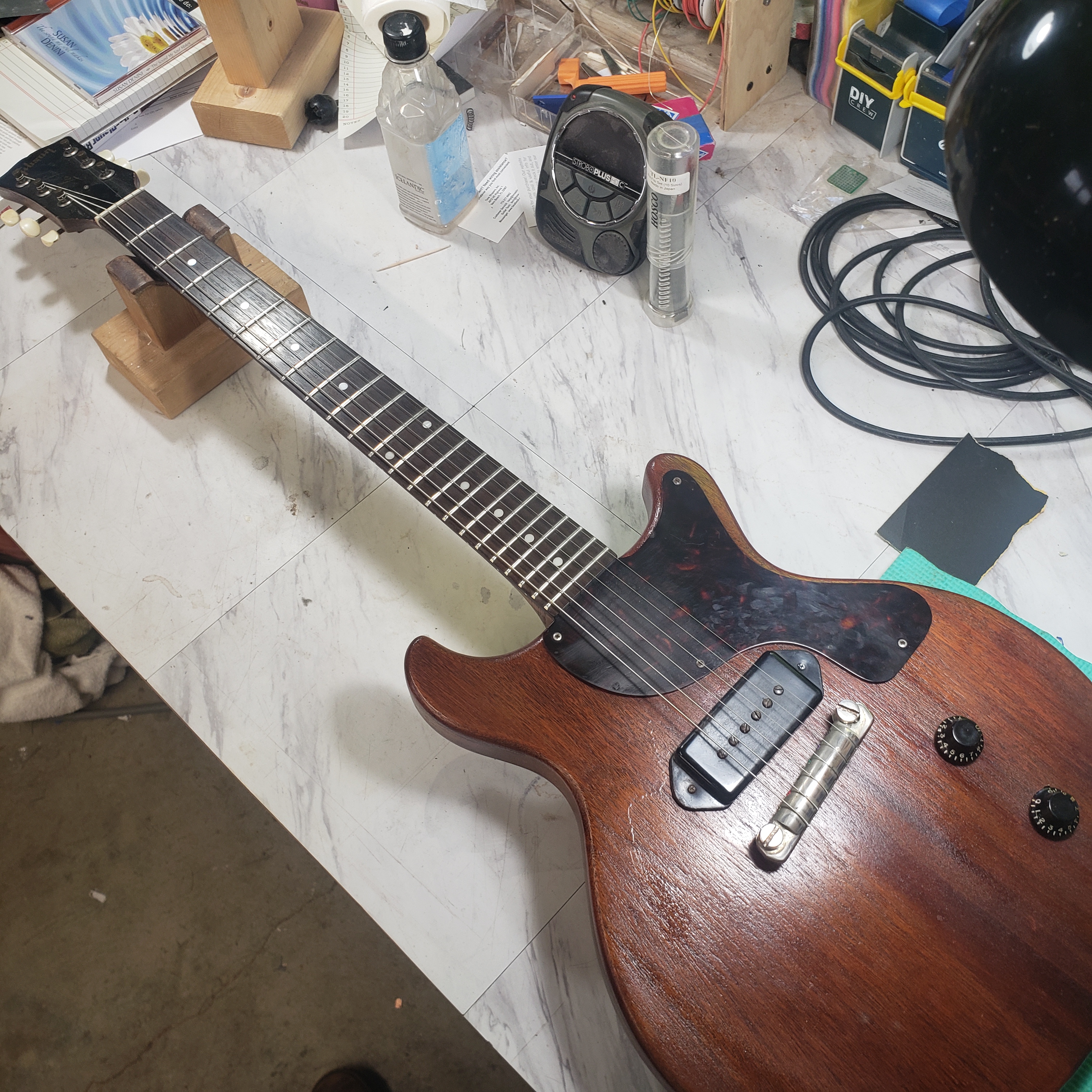 This 58' Les Paul Junior DC needed the fretboard radius corrected and a re-fret